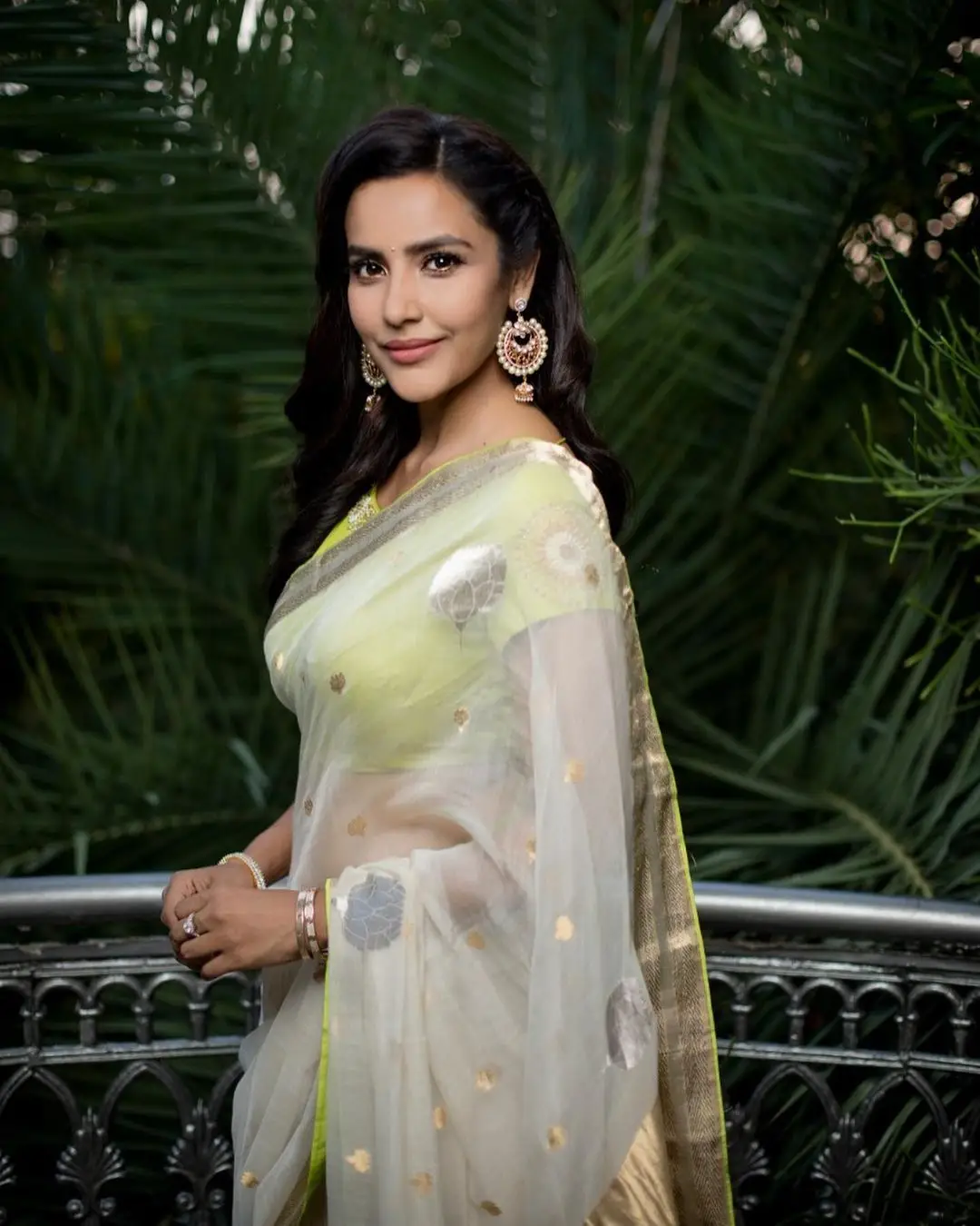 Actress Priya Anand Images in Green Color Saree Sleeveless Blouse